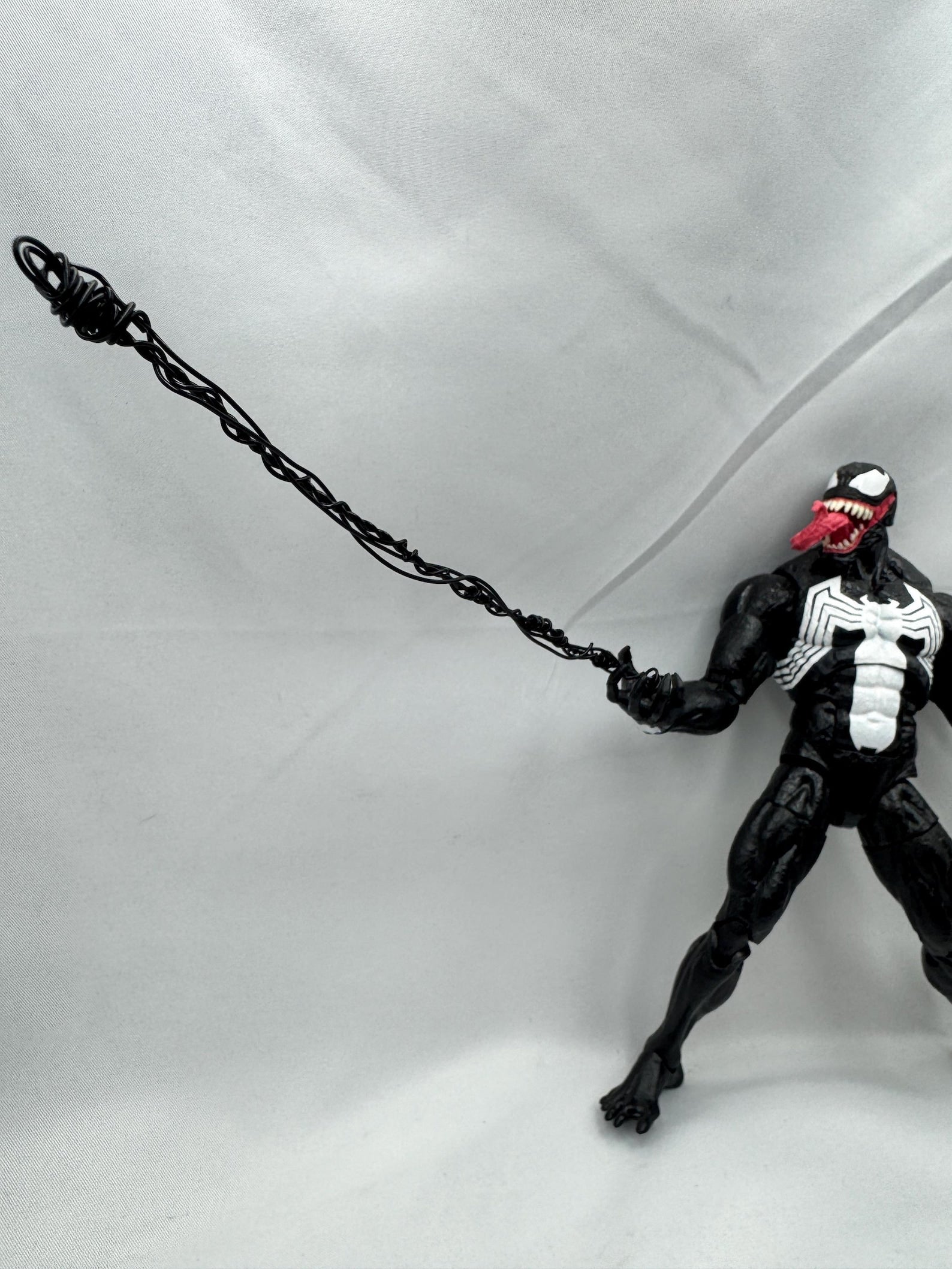 Posable web on display base