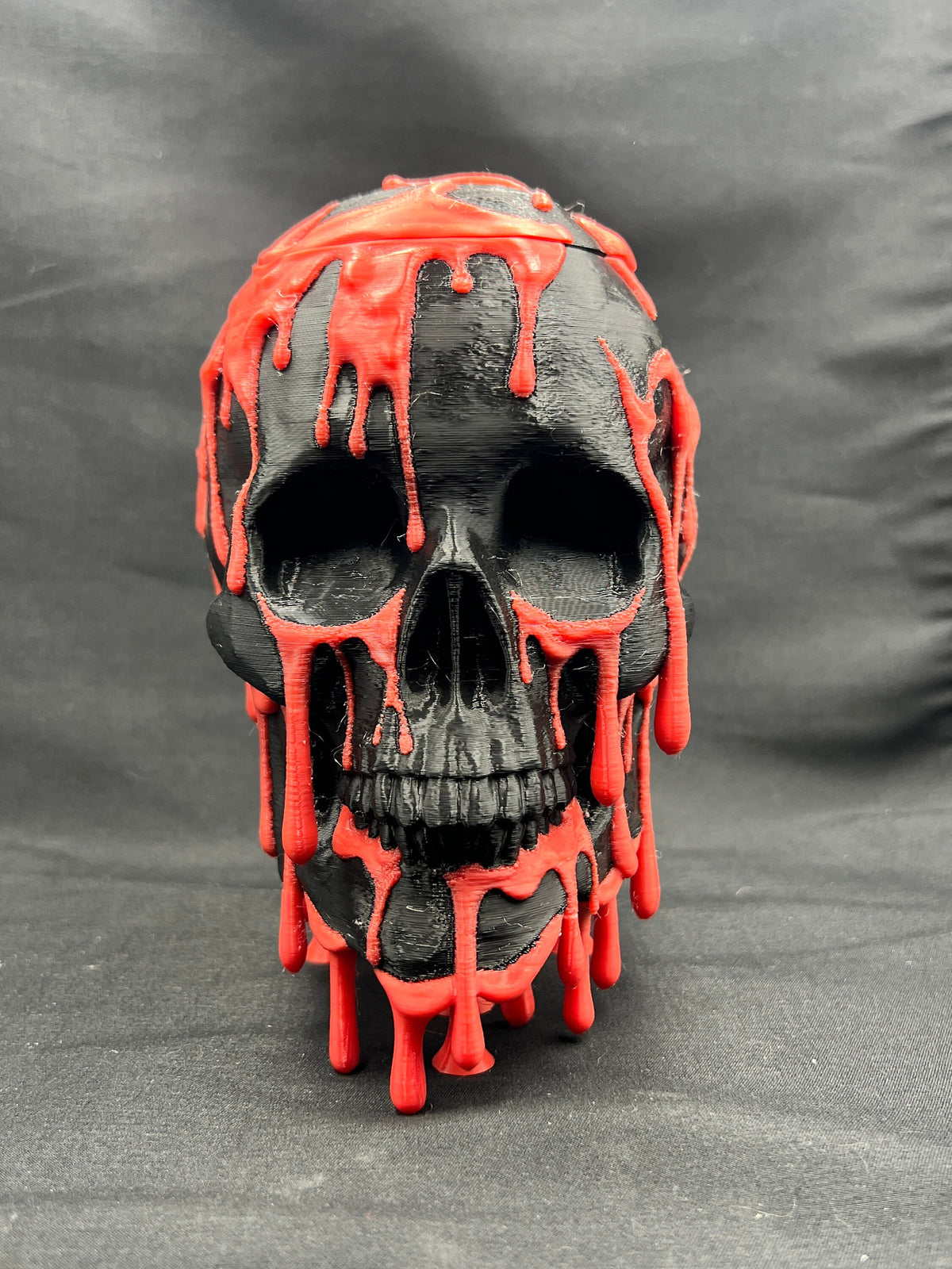 Skull Candy Dish, black with red drips, front view